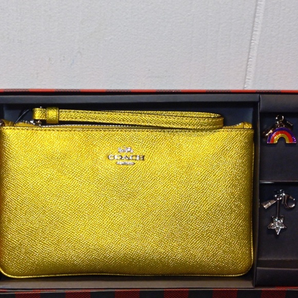 Coach Handbags - COACH Lg Wristlet w/ Charms Wizard of Oz Box Set